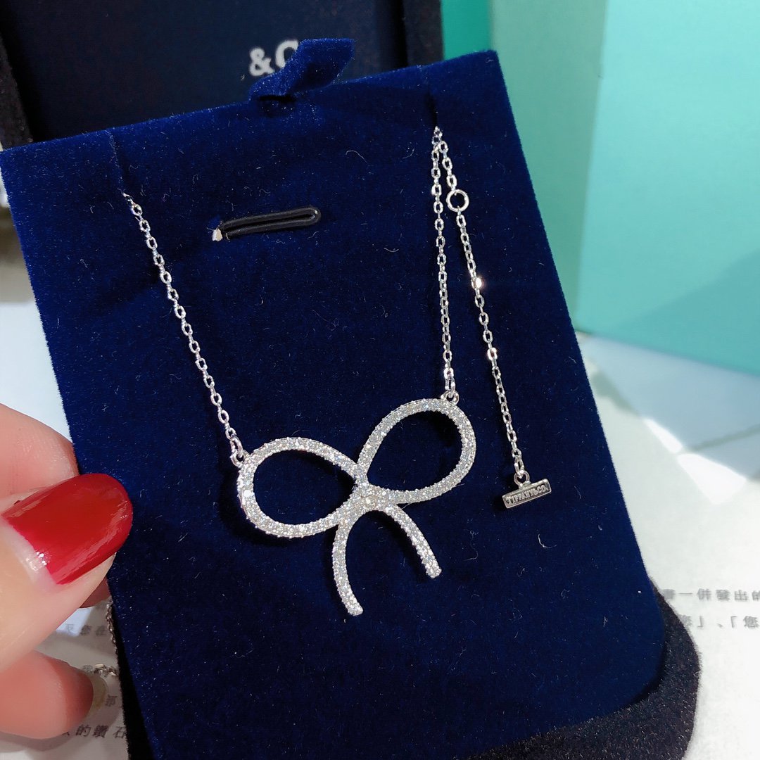 [Glow Muse ]CLAW SET RHODIUM PLATED BOW NECKLACE