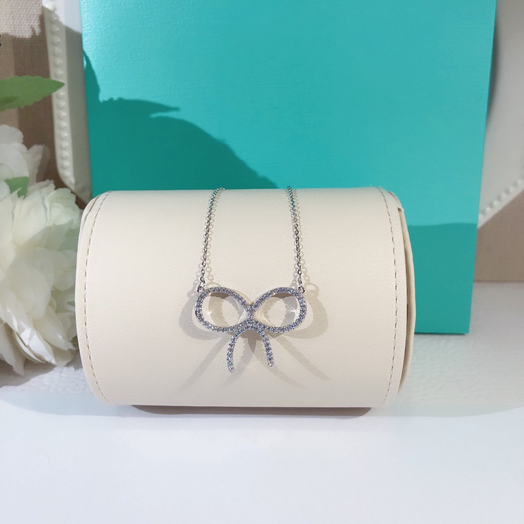 [Glow Muse ]CLAW SET RHODIUM PLATED BOW NECKLACE